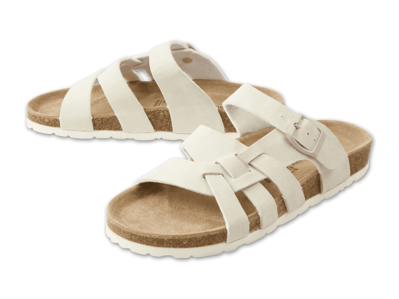 Zwei weiße Riemchensandalen mit Korksohle auf schwarzem Hintergrund