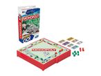 Monopoly Grab & Go game set with board, money, dice, and game pieces.
