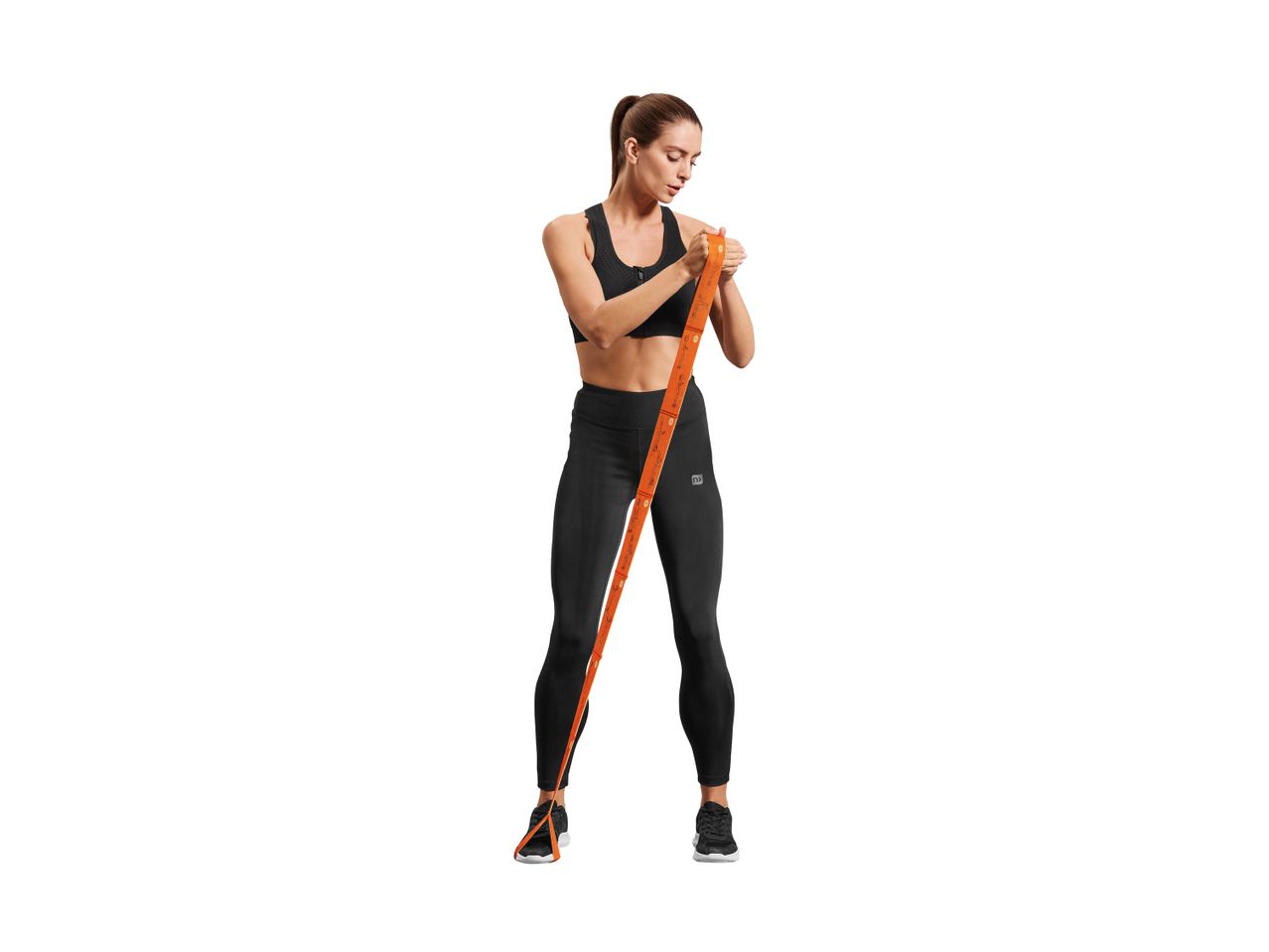 Woman in black sportswear holding an orange resistance band with exercise illustrations.