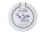Honey jar lid with lavender flowers, a bee, and text about natural honey.