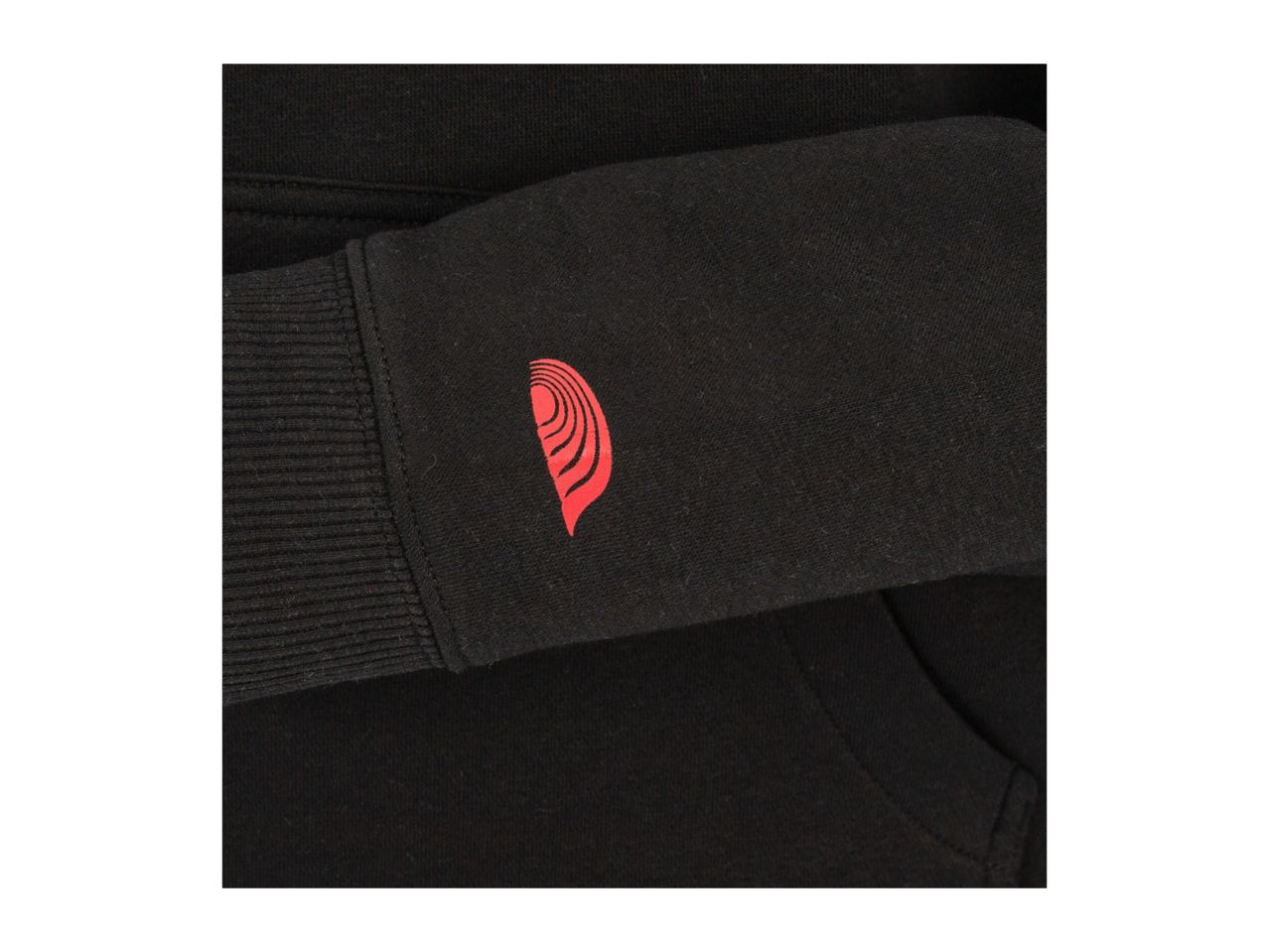 Black hoodie with a red half-circle logo on the sleeve.