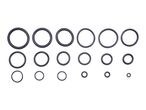 A collection of black rubber O-rings in various sizes, arranged in rows.