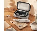 Cien Beauty manicure/pedicure set with various attachments and case on a wooden surface