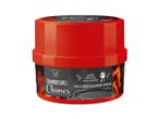 Red container of barbecue cleaner, sponge included.
