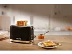 SILVERCREST® 2-Slice Toaster in black with toast and jam on a wooden counter.