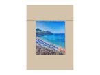 Shower curtain with a vibrant beach scene featuring blue and orange umbrellas.