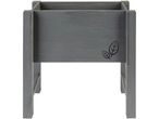 Gray wooden planter box with a leaf design on the side
