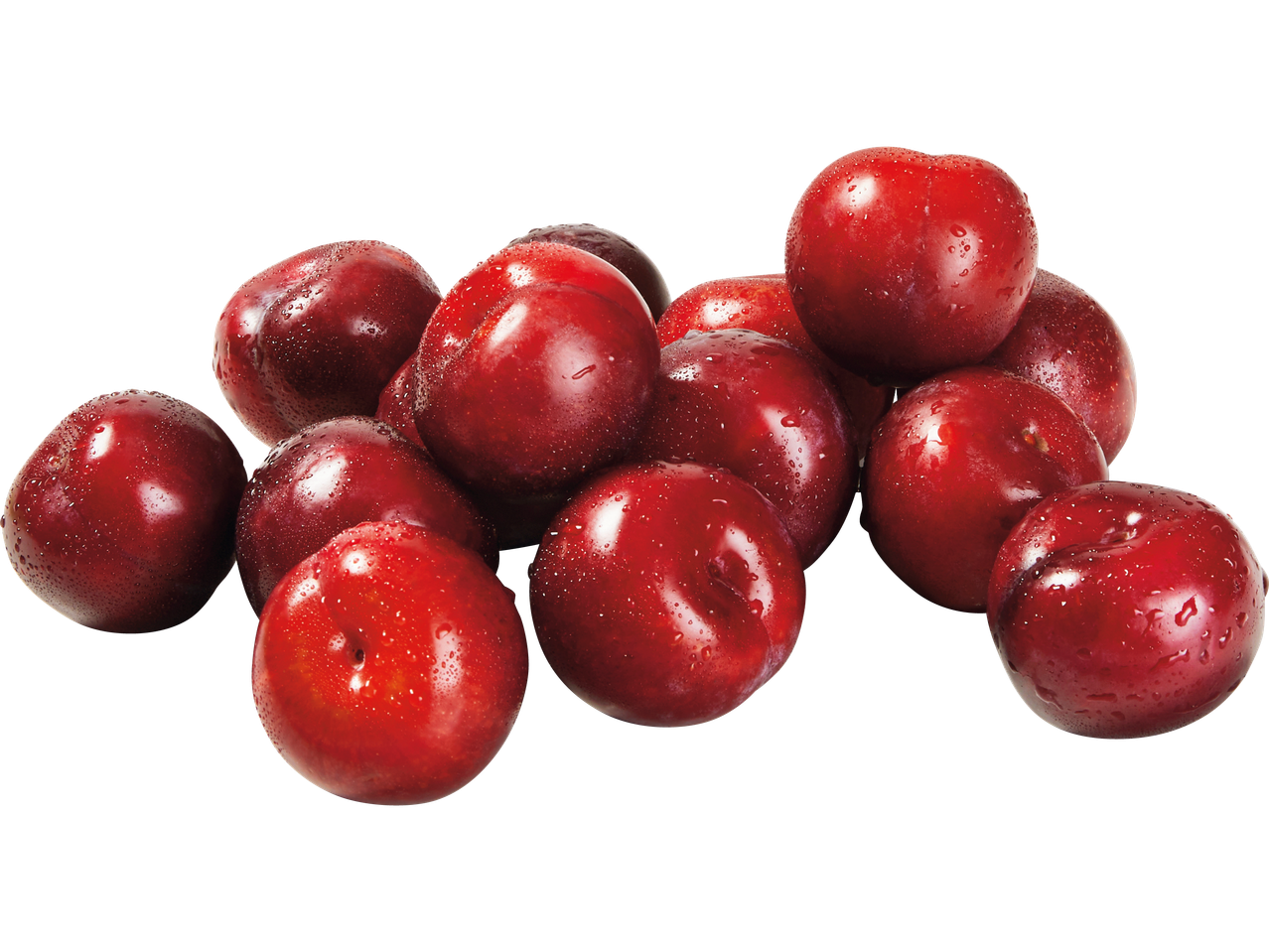 En hög med färska röda plommon.