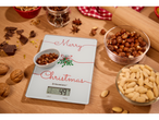 SILVERCREST® Digital Kitchen Scales with nuts, chocolate, and spices on a wooden surface.