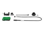 A set of rotary tool accessories including a flexible shaft, stand, clamp, and storage case.