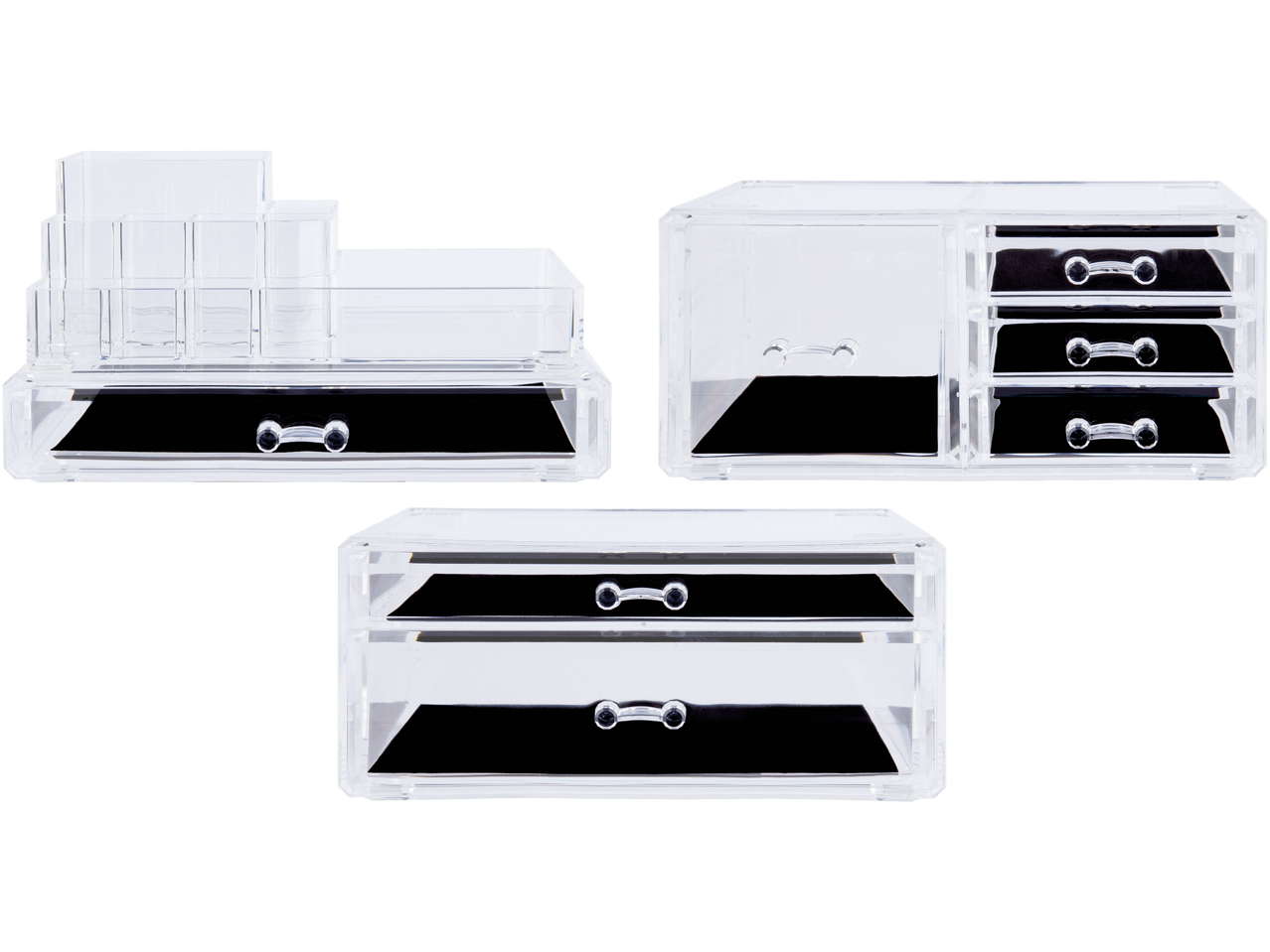 Tre genomskinliga akrylförvaringslådor med svarta insatser och silverhandtag.