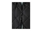 Close-up of a black quilted vest with a zipper and drawstring detail.