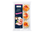 Mini pizzas aux champignons et jambon dans un emballage transparent