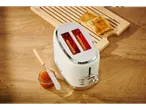 SILVERCREST® toaster with two slices of toast and a jar of jam on a wooden table.
