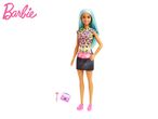 Barbie doll with teal hair, leopard print top, and makeup accessories.