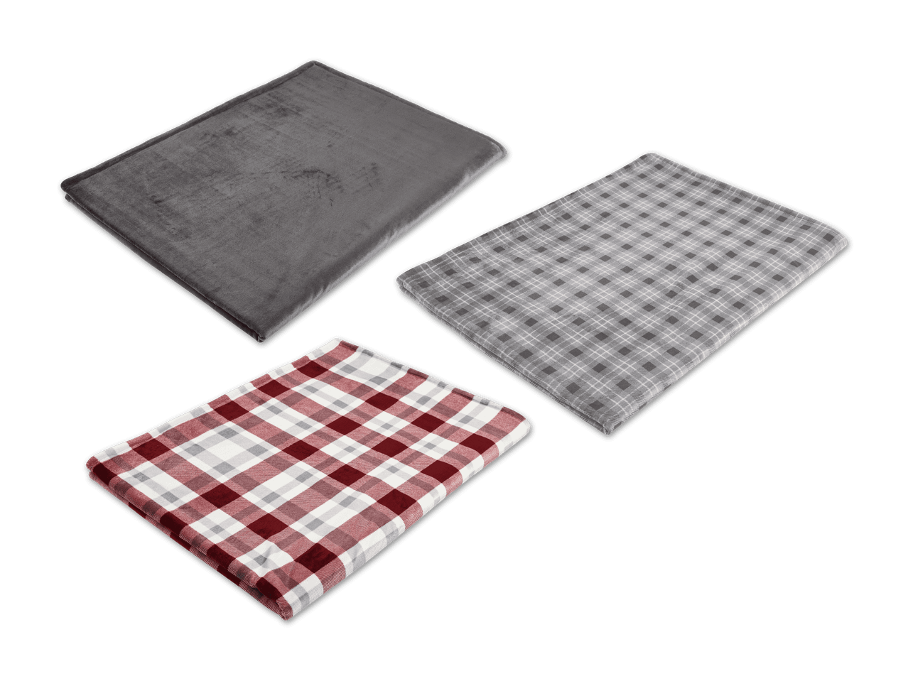 Drei Fleecedecken: eine graue, eine grau karierte und eine rot-weiß karierte Decke