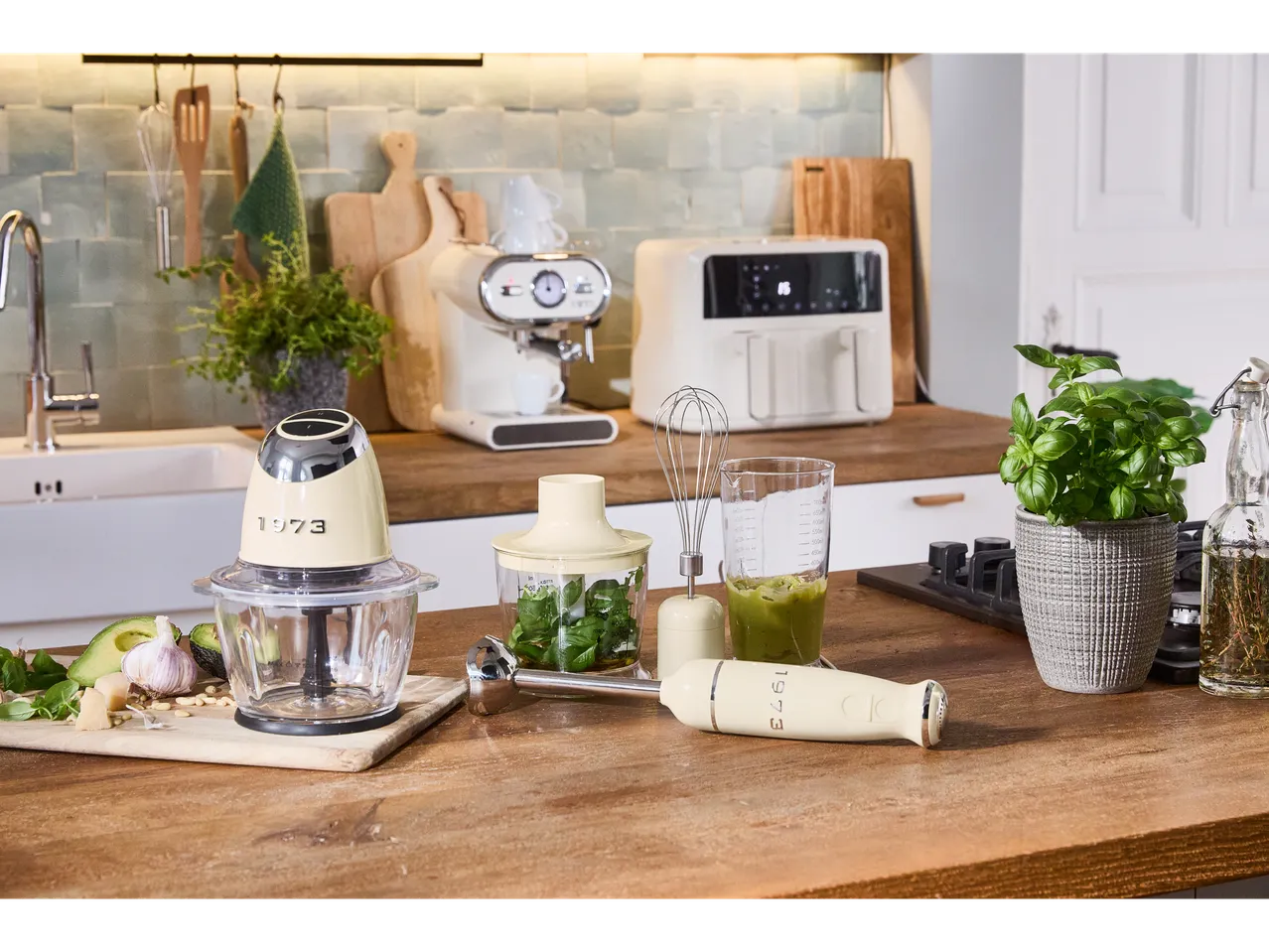 SILVERCREST® Hand Blender Set and other kitchen appliances in a modern kitchen.