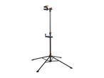 Bicycle repair stand with a clamp, tool tray, and tripod base