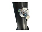 Close-up of a black beverage dispenser with a shiny chrome tap.