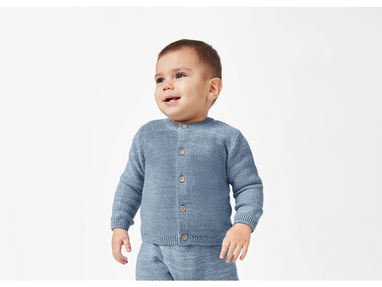 Lupilu baby cardigan in blue on a child
