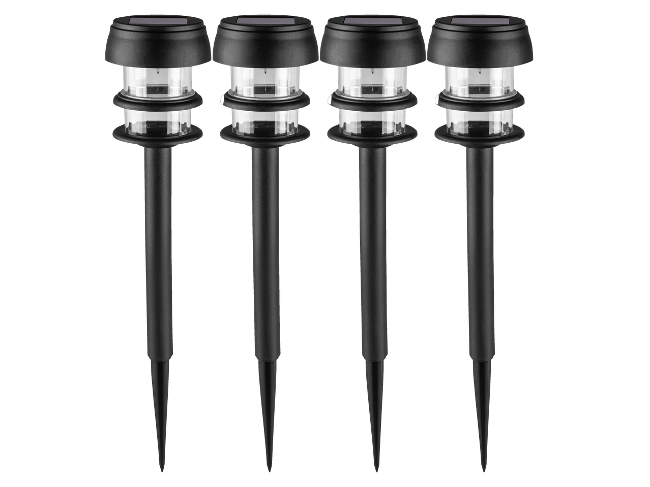 Quatro lâmpadas solares pretas LIVARNO com abajures transparentes e estacas de solo.