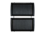 Open electric grill with two non-stick cooking plates, top view.