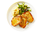 Pork chops with mashed potatoes and green beans on a white plate.