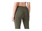 Rear view of a woman wearing olive green leggings with a side pocket.