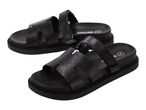 Pair of black sandals with a snakeskin texture and thick soles.