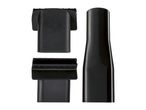 Three black vacuum cleaner attachments: two flat nozzles and one crevice tool.