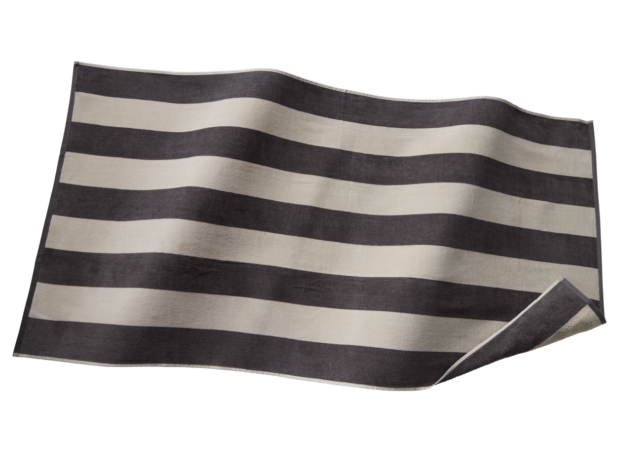 Striped beach towel in dark grey and off-white, with a slight wave.