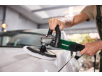 A person polishing a white car with a power polisher.