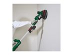 Person using a long-reach wall and ceiling sander on a white wall.