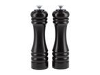 Two black pepper mills with silver tops on a white background.