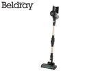 A black and gold cordless stick vacuum cleaner with a lighted brush head.
