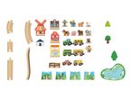 A collection of wooden farm-themed toys, including train tracks, buildings, animals, vehicles, and landscape pieces.