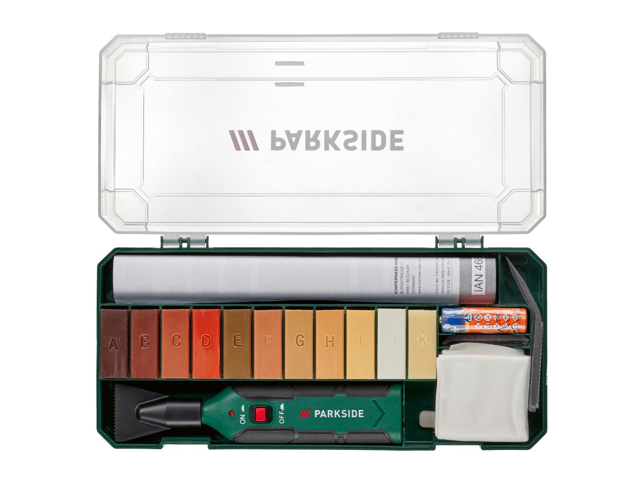 A repair kit with various colored wax sticks, a heating tool, and accessories in a green case.