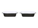 Two rectangular black and white ceramic baking dishes with handles.