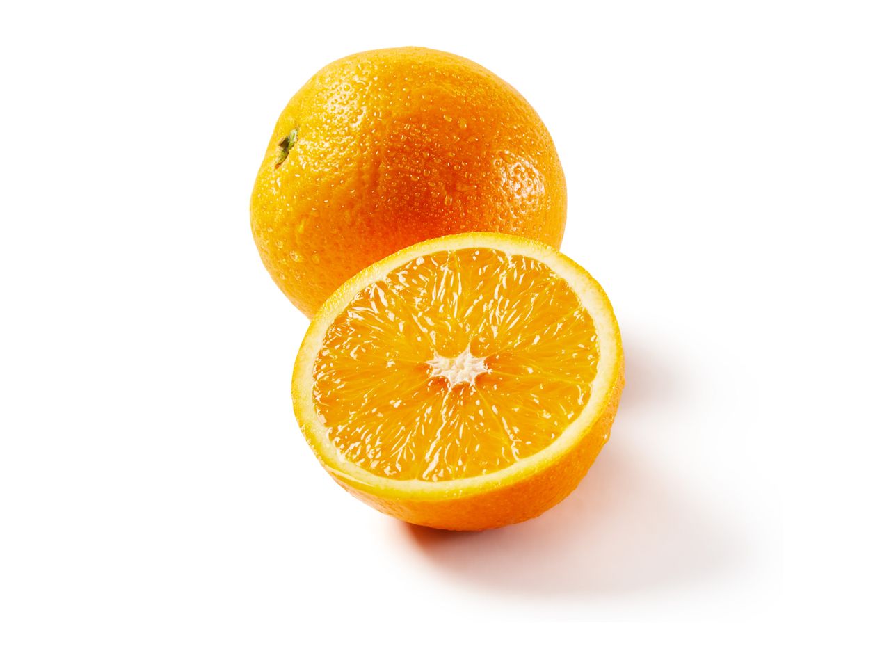 Whole and halved fresh oranges with water droplets on a white background.