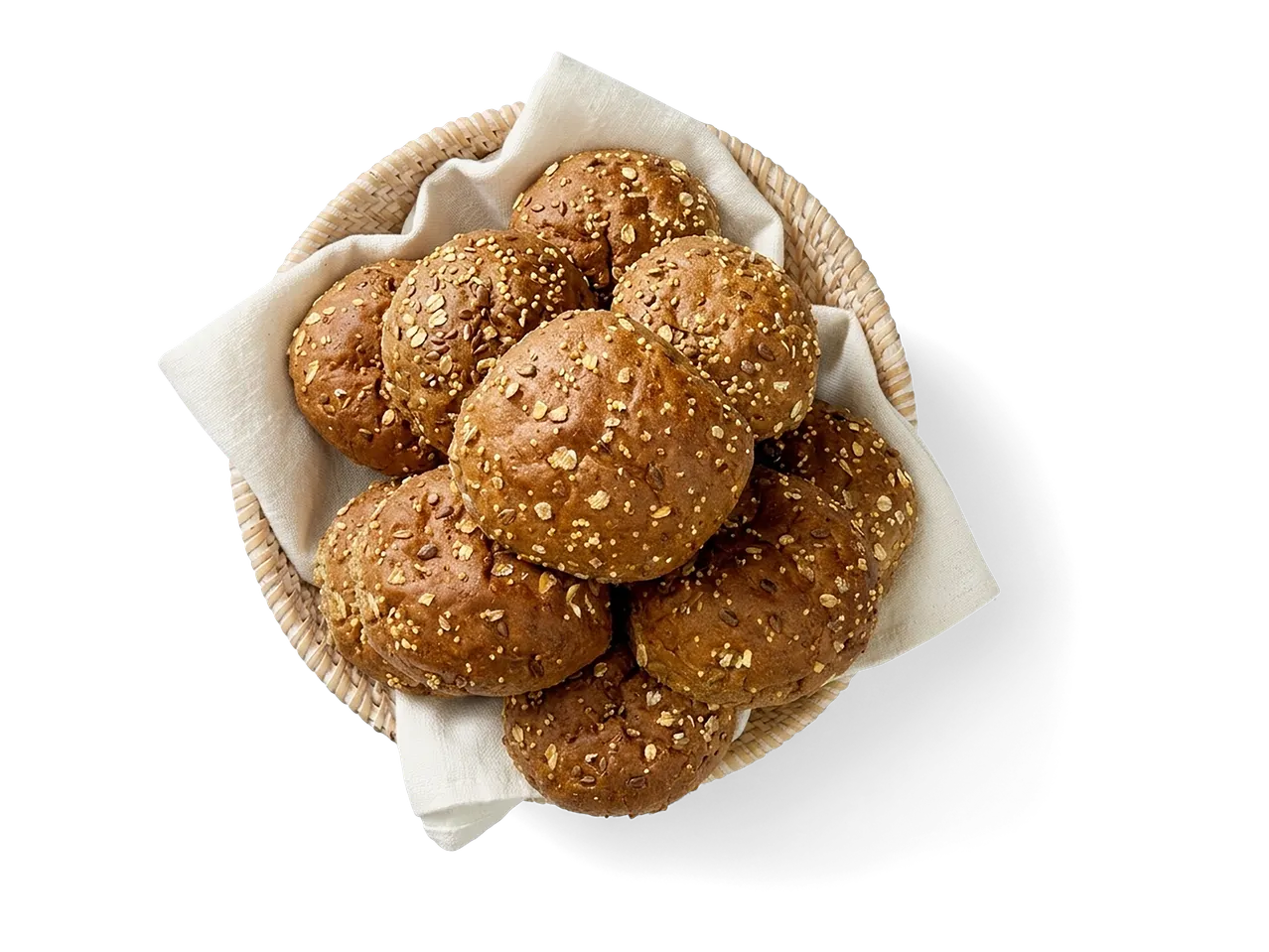 Meergranenbollen in een rieten mand met een witte doek.