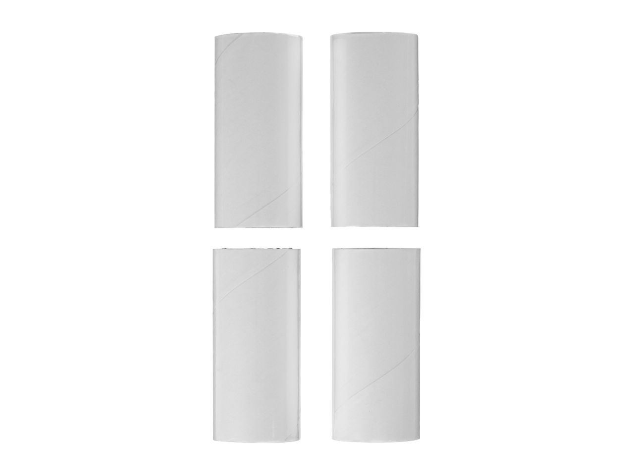 Four empty white toilet paper rolls arranged in two rows on a white background.