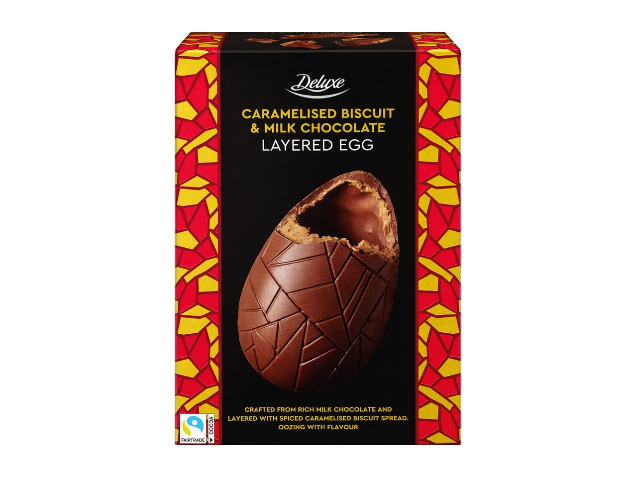 Caramelised biscuit and milk chocolate layered egg in a black box with red and yellow patterns.