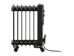 Black oil-filled radiator on wheels with a power cord, side view.