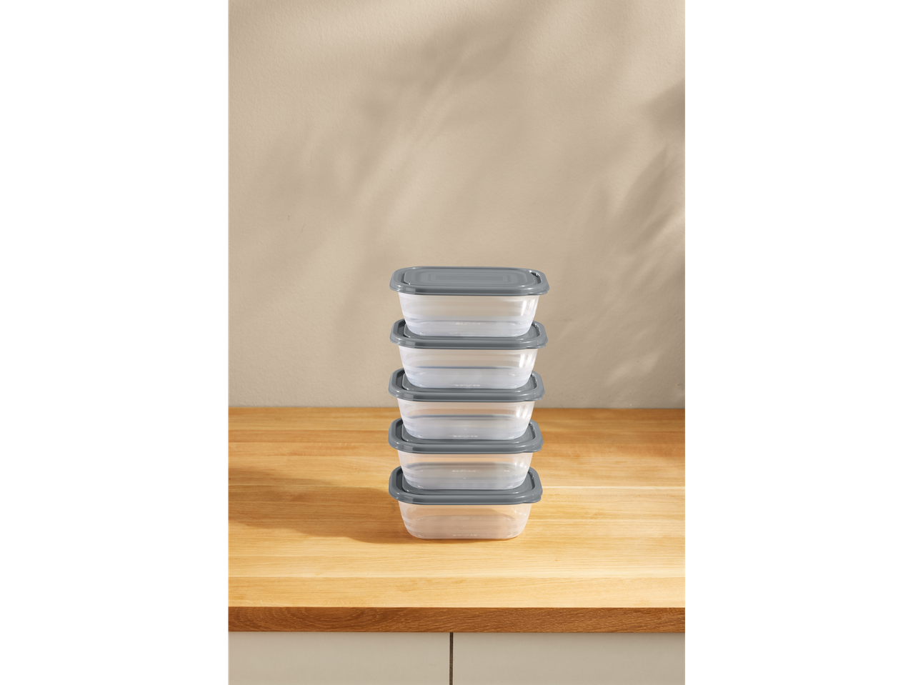 Stack of plastic food storage containers.