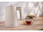 SILVERCREST® 3000W Kettle in cream, with tea and cookies on a wooden counter.