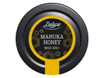 Deluxe Manuka Honing MGO 400+ potdeksel met een zwart en geel etiket.