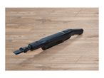 Handheld vacuum cleaner with a brush attachment on a wooden floor