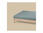 A light wooden bed frame with a fitted blue-green sheet on a beige background.