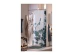 Bathroom with eucalyptus shower curtain, bath mat, towels, and bathrobe.