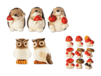 Keramikfiguren von Igeln, Eulen und Pilzen